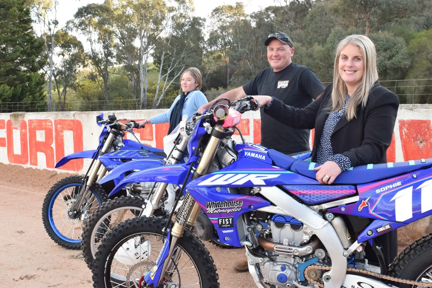 REVVED UP: Bailey Walch (left), Myrtleford Speedway Club president Glen Walch and treasurer Sophie Corbett are excited for the start of the motorsports season this year. PHOTO: Brodie Everist Id:29398