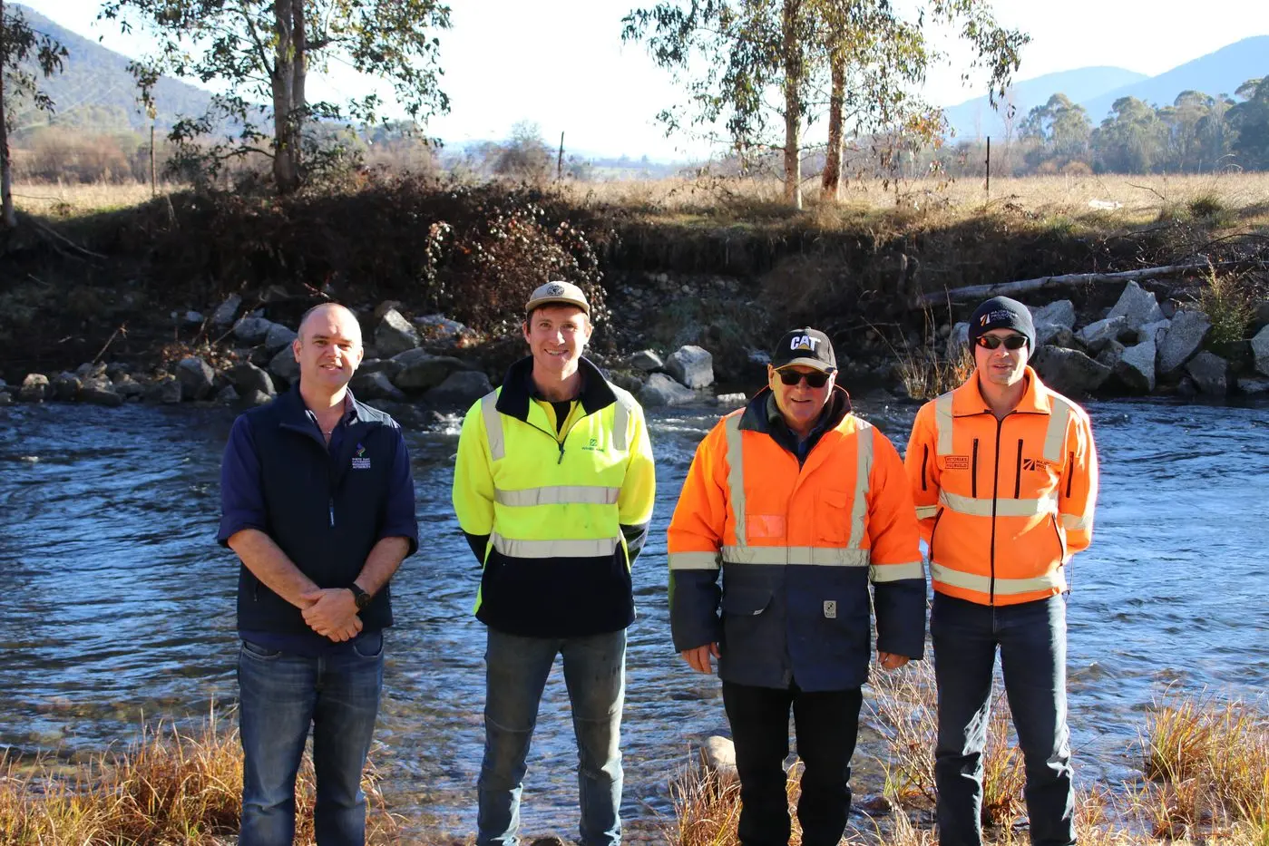 PAVING THE PLANKS FOR RENEWAL: Looking forward to the benefits of the Kiewa River rehabilitation project are (from left) Richard Dalkin from North East CMA; Patrick Newman and Charlie Whelan, Whelans Group; and James Aroin, Major\\nRoad Projects Victoria (MRPV).