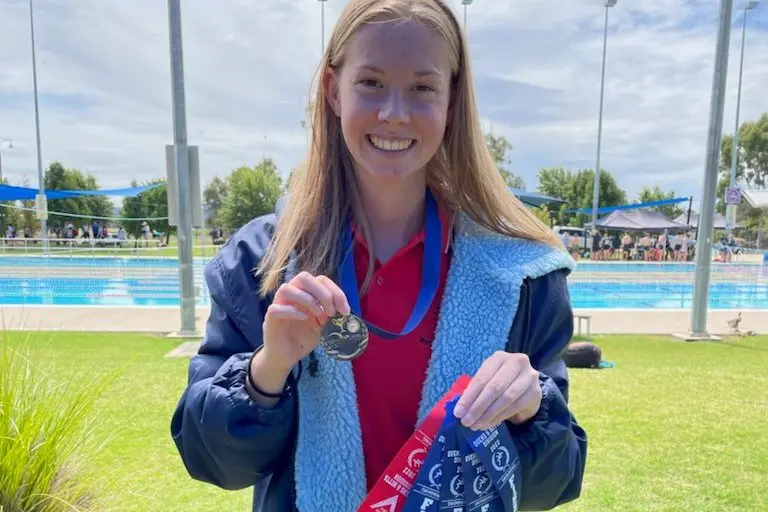 TOP EFFORT: Amy Gunson not only was Myrtleford P12 College\\'s aged champion in the 20 year female section, but she also was open age champion at the Ovens and Mitta School Swimming Championships. Id:22051