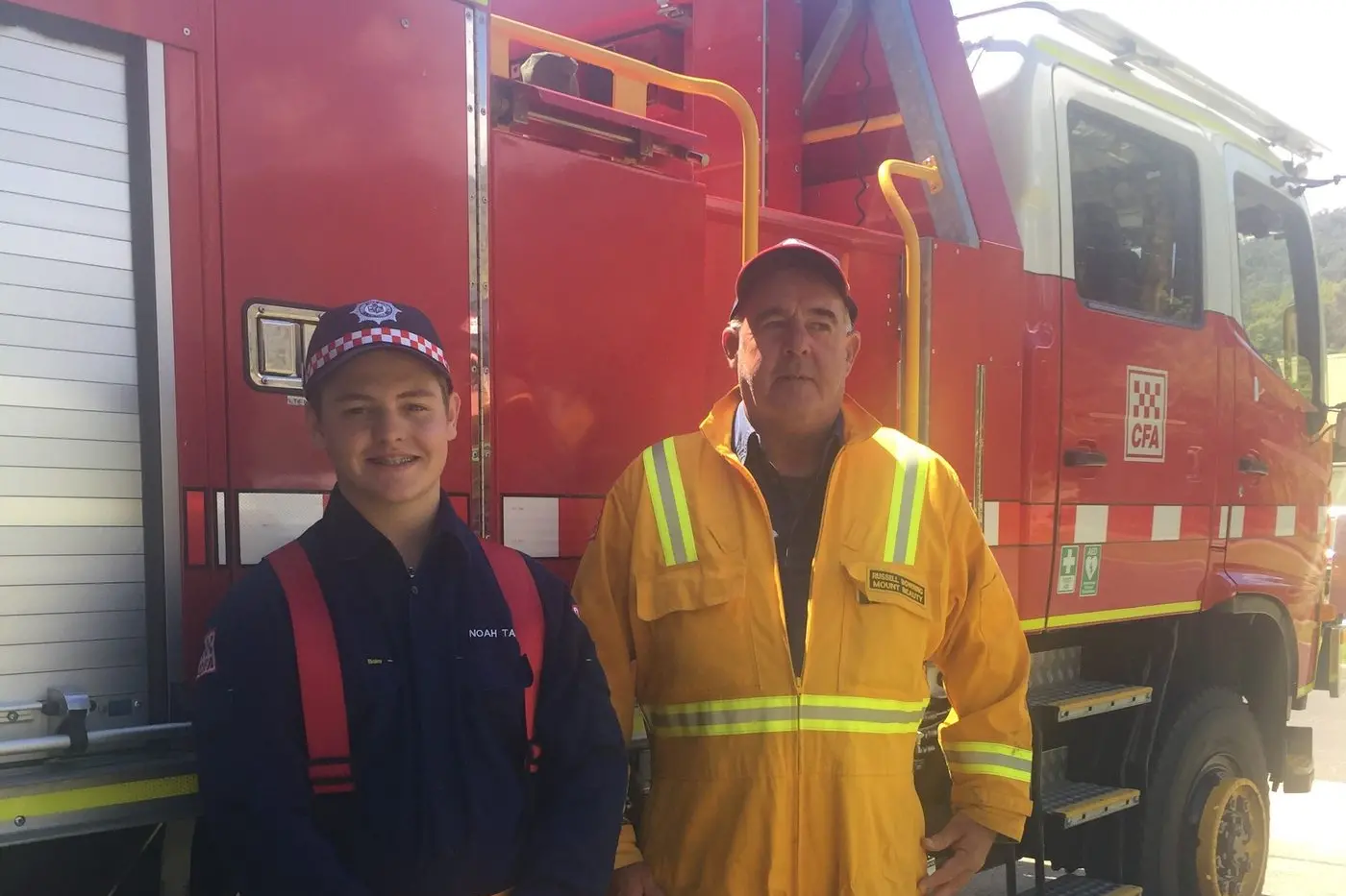 HELPING OTHERS: Noah Tanzen is a proud member of the Mt Beauty CFA. Brigade captain Russell Bowring (pictured right) said the 18 year old is highly enthusiastic and very committed to the community. PHOTO: Fay Mason Id:20707
