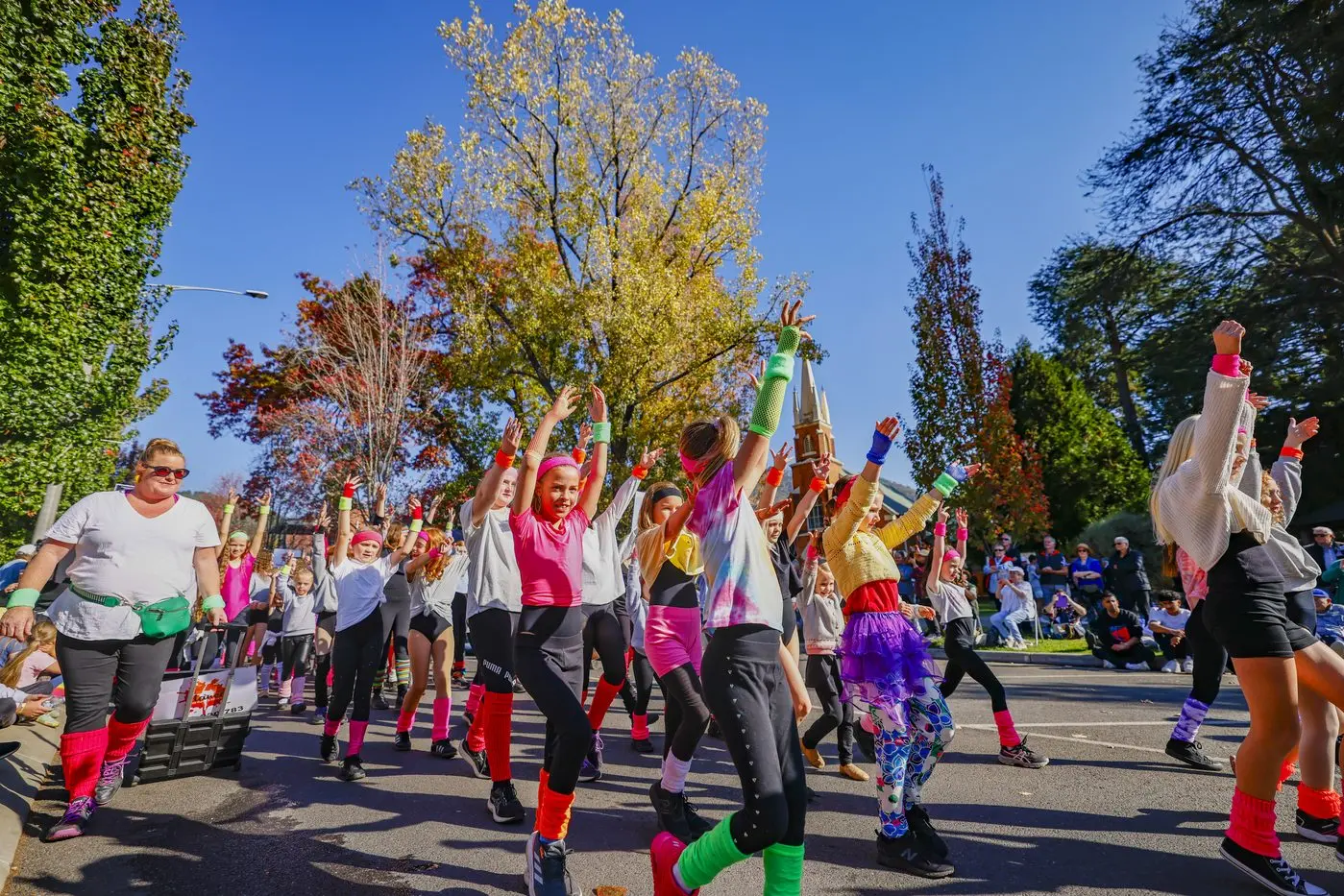 LADIES OF THE 80S: Active acrobats from Bright inspired the crowd with their Flashdance float. PHOTOS: Jean-Pierre Ronco.