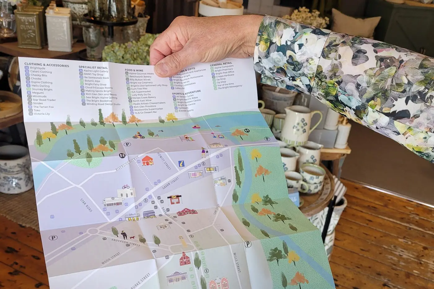 Side One: a beautifully designed map of town.