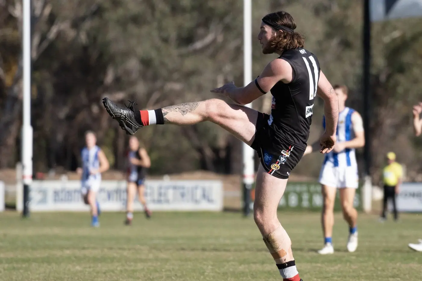 IN FORM: Riley Smith and ruck brother Toby Cossor wore down the league\\'s premier ruckman in Myrtleford\\'s 22-point win over the Tigers. PHOTO: Melissa Beattie