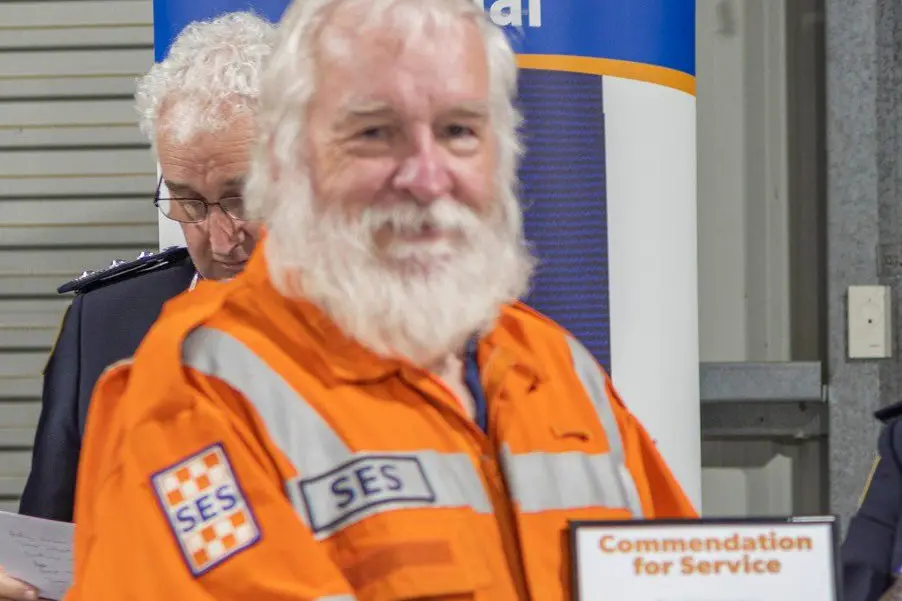 SERVICE SALUTE: Bright SES Unit Controller, Graham Gales received his Commendation for Service throughout two score years.