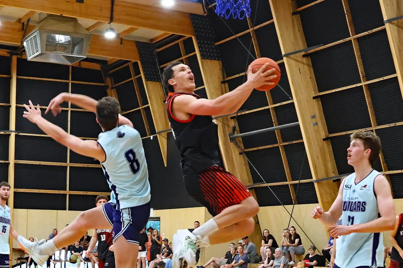 LAY UP: Marcus La Spina leaps for the ring in the Saints\\' three point loss to Albury on Saturday. PHOTOS: Janet Watt