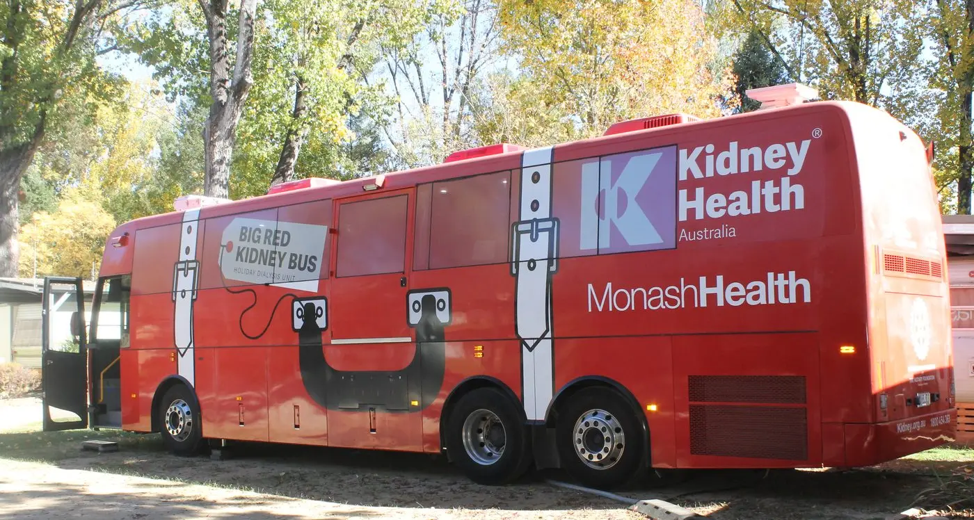Patients make use of Big Red Kidney Bus parked in Porepunkah