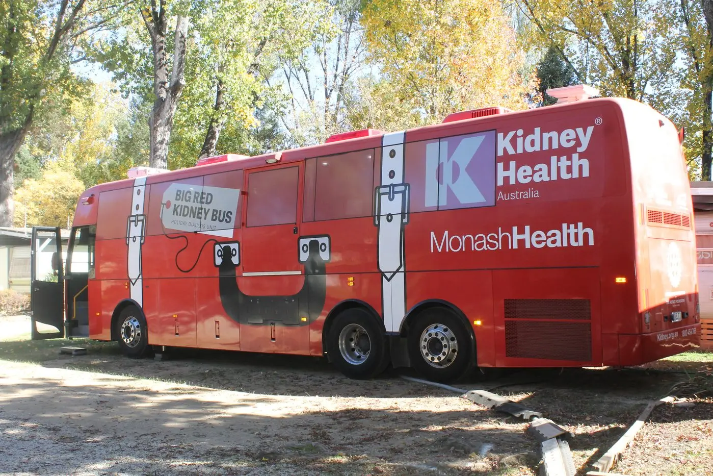 PARKED IN POREPUNKAH: Locals and residents are invited to book in for a kidney health check while the Big Red Kidney Bus is at the Mount Buffalo Caravan Park. PHOTO: Phoebe Morgan