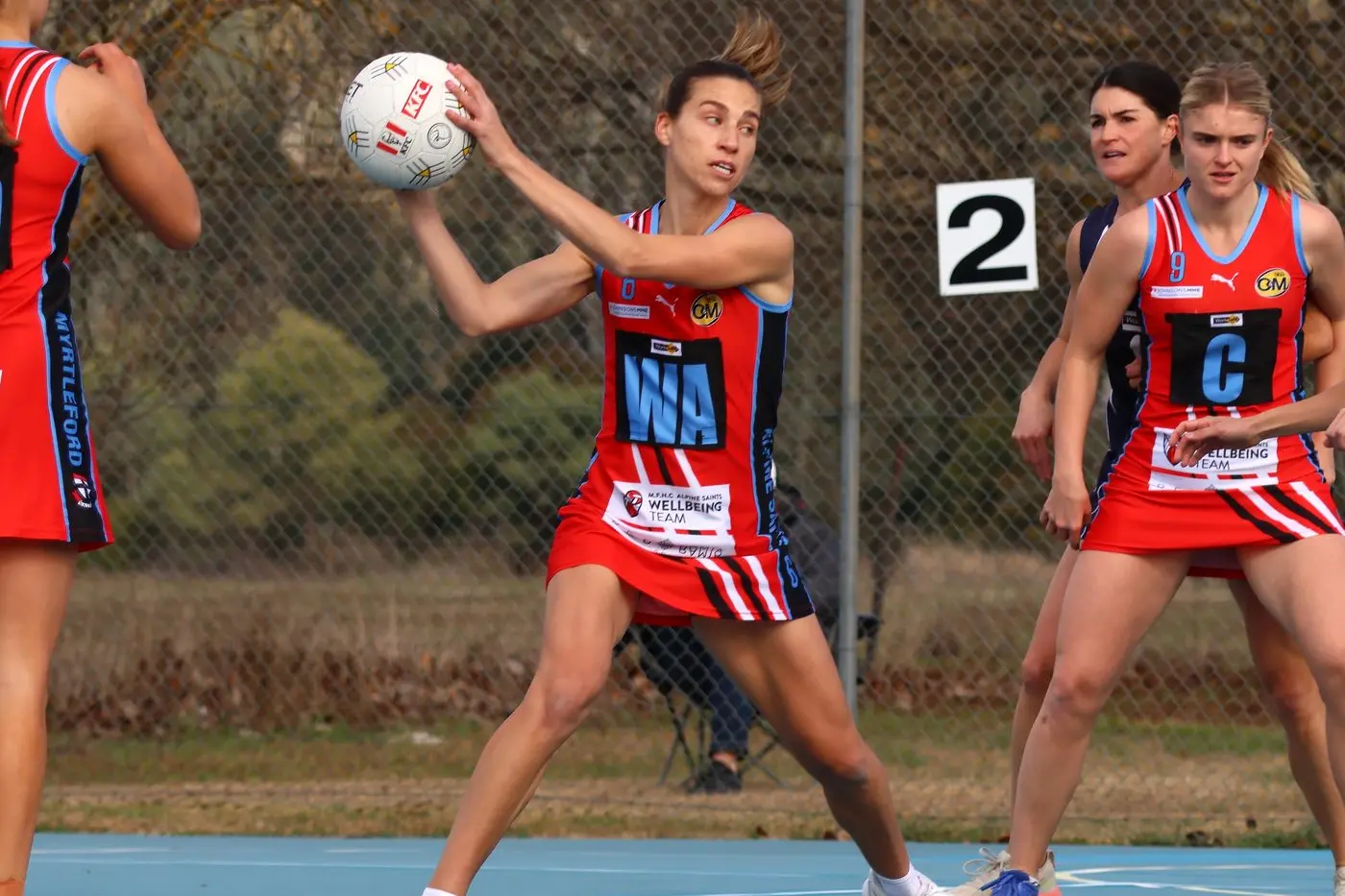 PRESSURE ON: Saige Broz brings the ball into the Saints attacking end. PHOTOS: Janet Watt