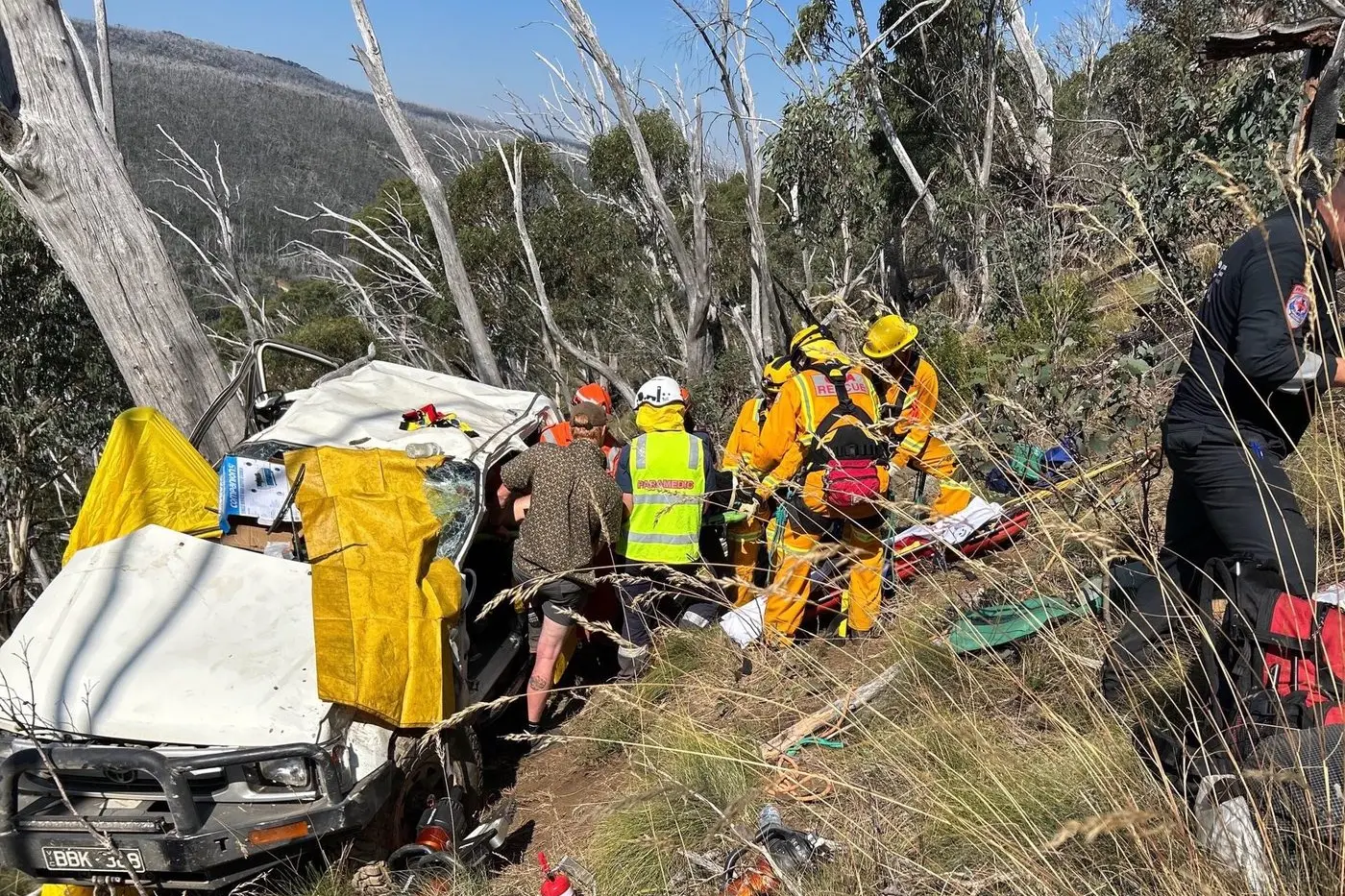 FOUR-WHEEL FLIP: A passenger was able to exit the tossed truck, but the driver required rescue after becoming trapped inside the vehicle. PHOTOS: Bright SES