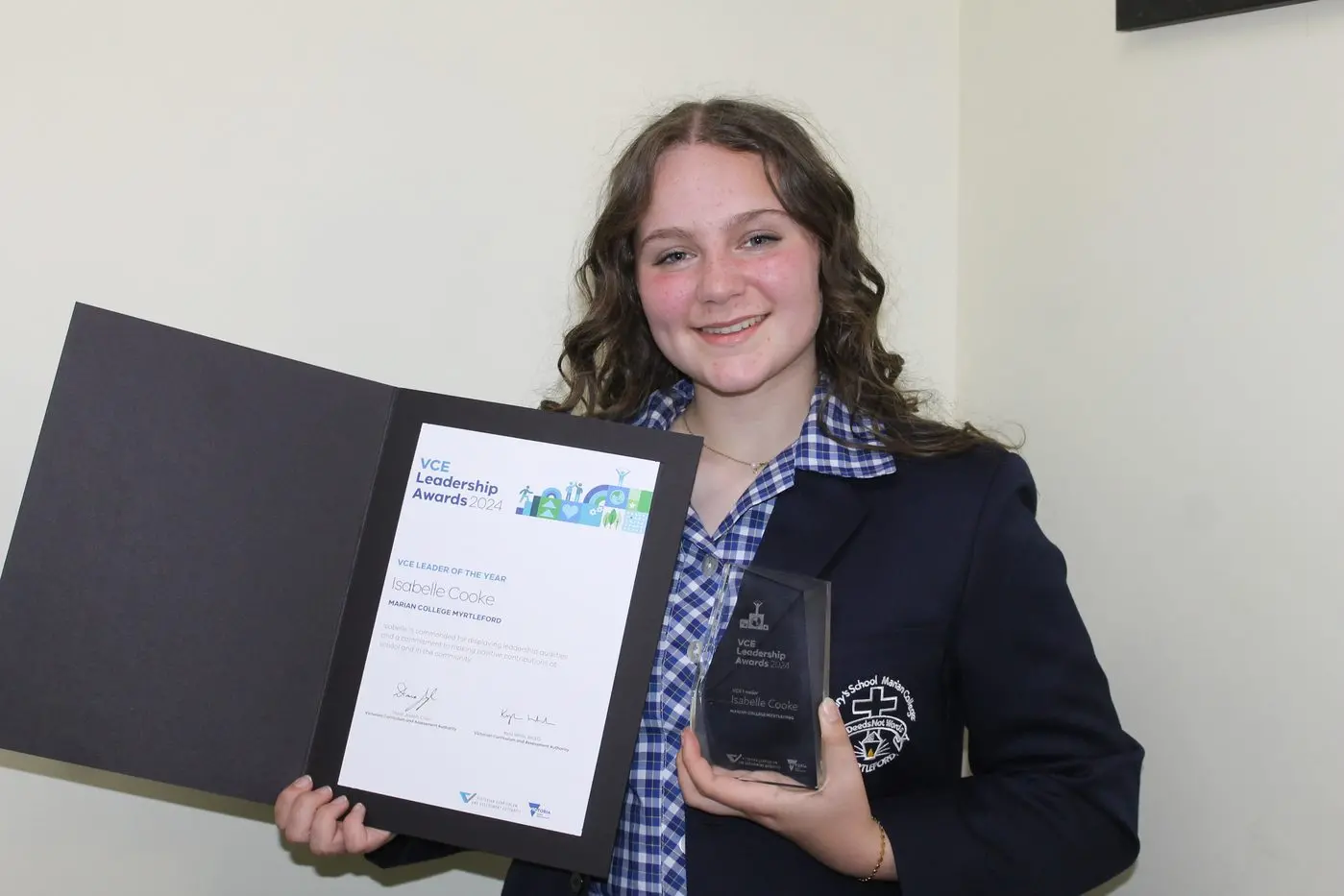 VICTORIAN HONOUR: Marian College year 12 student Isabelle Cook with her award after being announced as the state\\'s \\'Leader of the Year\\'.