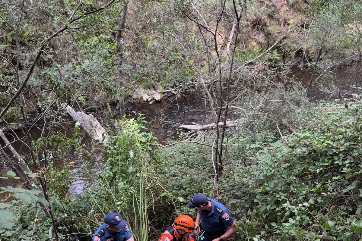 SLID OFF THE SIDE: Members of the Bright SES and Ambulance Victoria coordinated to return the patient to a more accessible area for assessment.