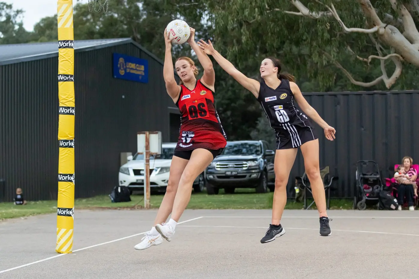 LEAPING: Daisy O\\'Kane flies for the ball. PHOTOS: Marc Bongers