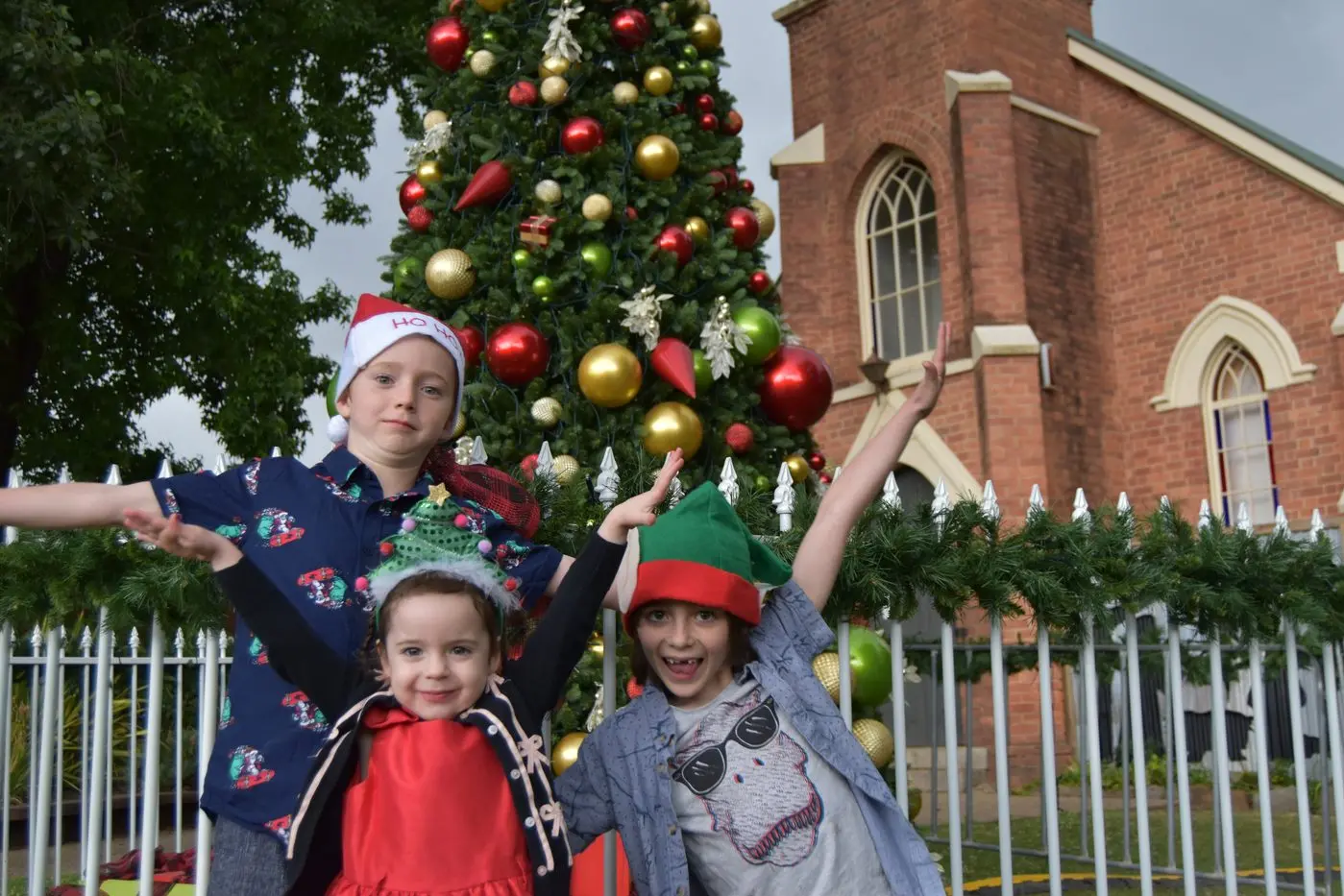 IN THE SPIRIT: Kody, Indiana and Brooklyn Watkins were among those to watch the tree light up on Monday evening. PHOTO: Nicki Letts