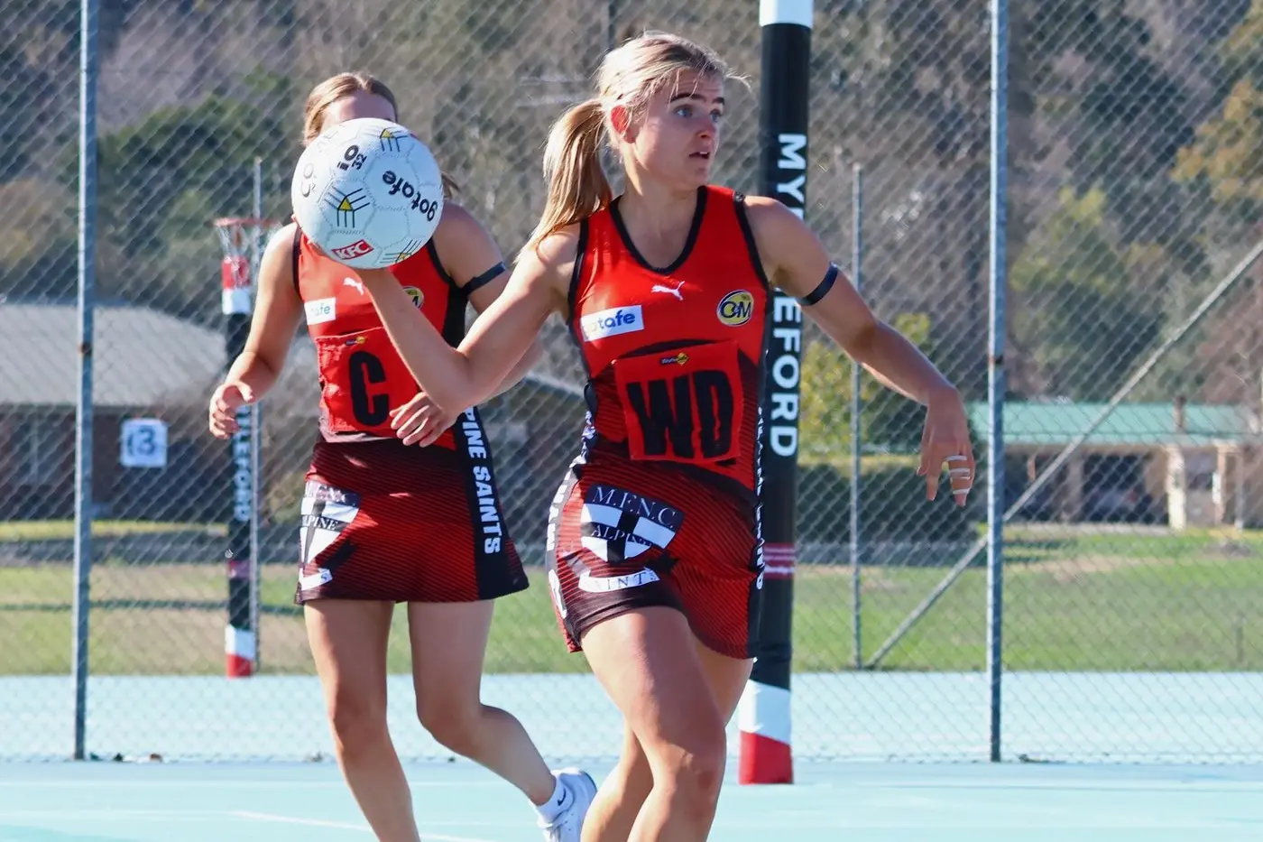 REBOUND PLAY: Jorja Reidy sends the Saints from their defensive end. PHOTOS: Janet Watt