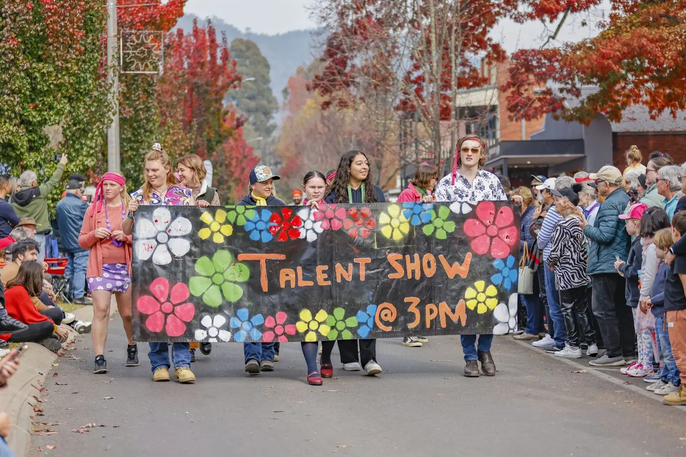 COLOURFUL COMPANY: Last year\\'s Gala Day Parade saw local students get into the Sixties\\' groove. PHOTO: Bright Autumn Festival