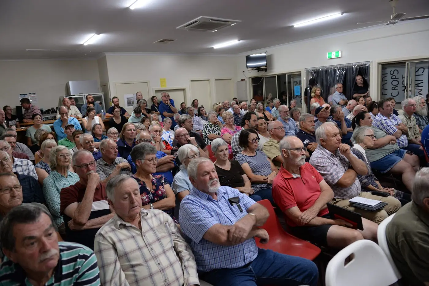 A LARGE CROWD: Over 200 attended the Dederang meeting, with some spilling outdoors. PHOTOS: Brodie Everist
