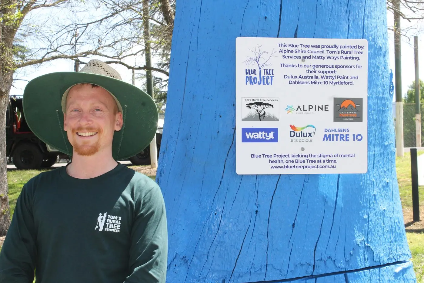 BRIGHT SMILES FOR A BLUE TREE: Organiser, Tom Nicholson was proud of the work from all involved on the day\\'s painting.