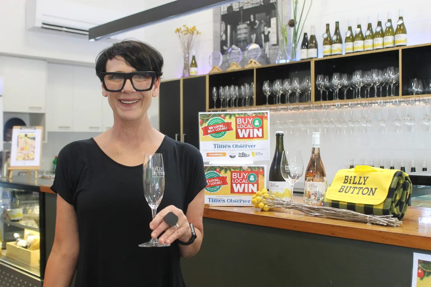 SHOP LOCAL AND WIN: Billy Button Wines cellar door supervisor Angela Slater looks to help customers find their perfect present pairing as they shop locally for the festive season.