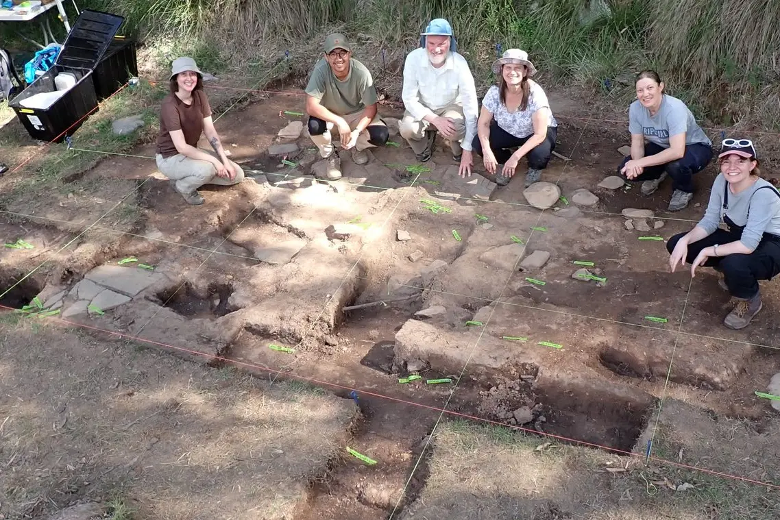 DISCOVERING HISTORY: Participants and staff at one of the two building sites excavated at the Chinese mining village.