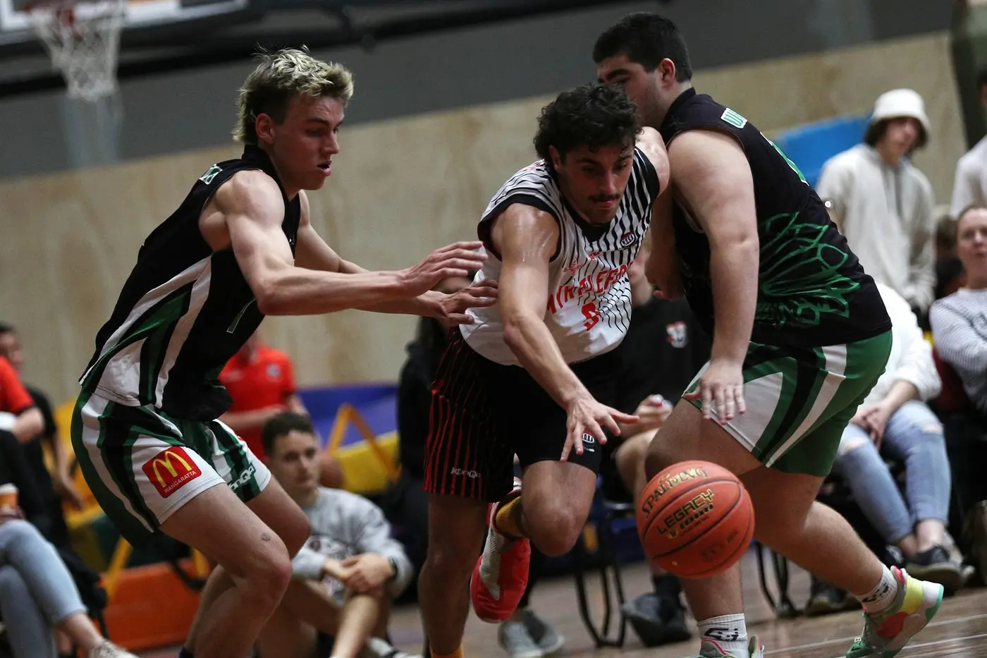 THREE POINT KING: Ryley Bouker (pictured last season) shot seven three-pointers in Myrtleford\\'s win over Wodonga on Satruday. PHOTO: Melissa Beattie