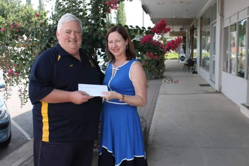 REUNITED: Lion Darren Murphy and Vanessa Rode reunite in Myrtleford with the donations from Canada now in safe hands of Myrtleford Lions Club. PHOTO: Ashleigh Piles   