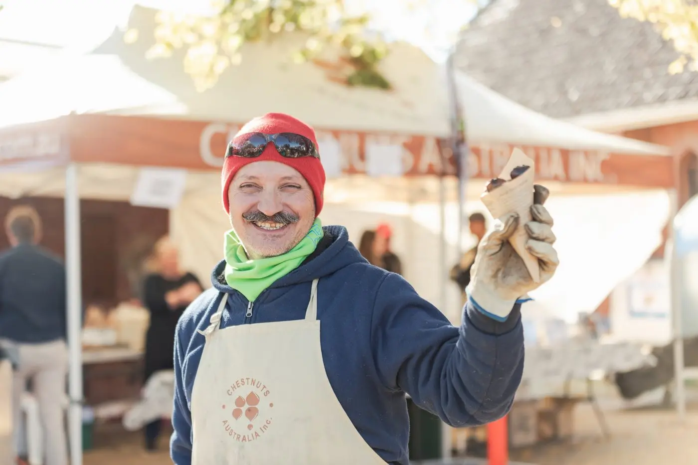 ROASTING AT THE READY: Josh Tobacco from Chestnuts Australia will supply this delicious savoury snack as always. PHOTOS: \\'By George Photography\\'.