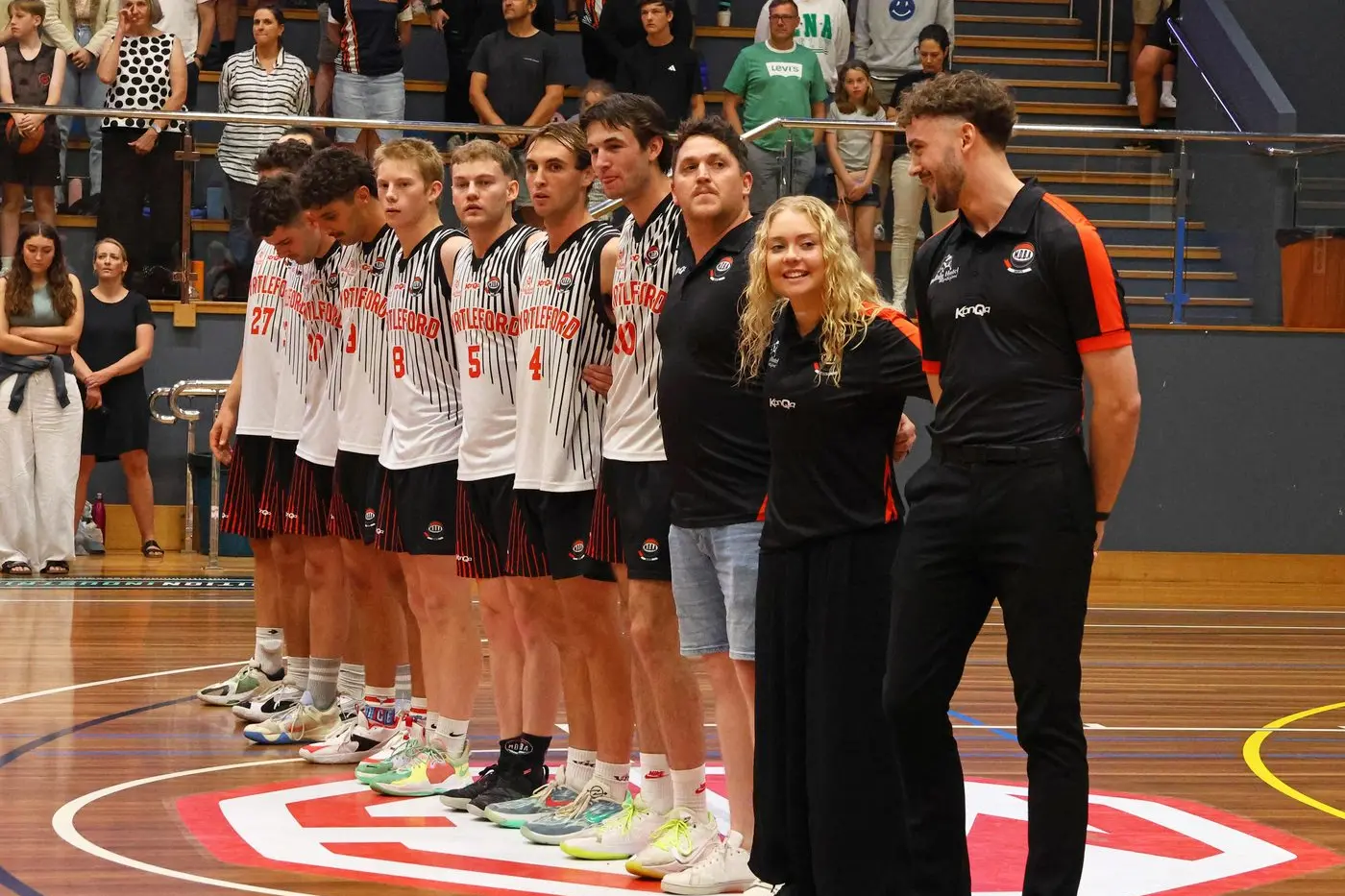 A STELLAR CREW: Myrtleford\\'s players and support team prepare for the grand final. PHOTOS: Janet Watt