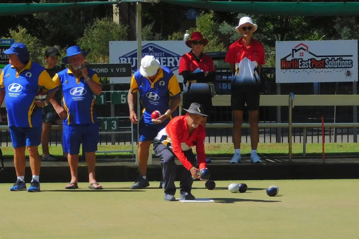 SCORCHING SHOT: Myrtleford A1 bowler Lance Symons sends down a bowl on a hot day on the greens.
