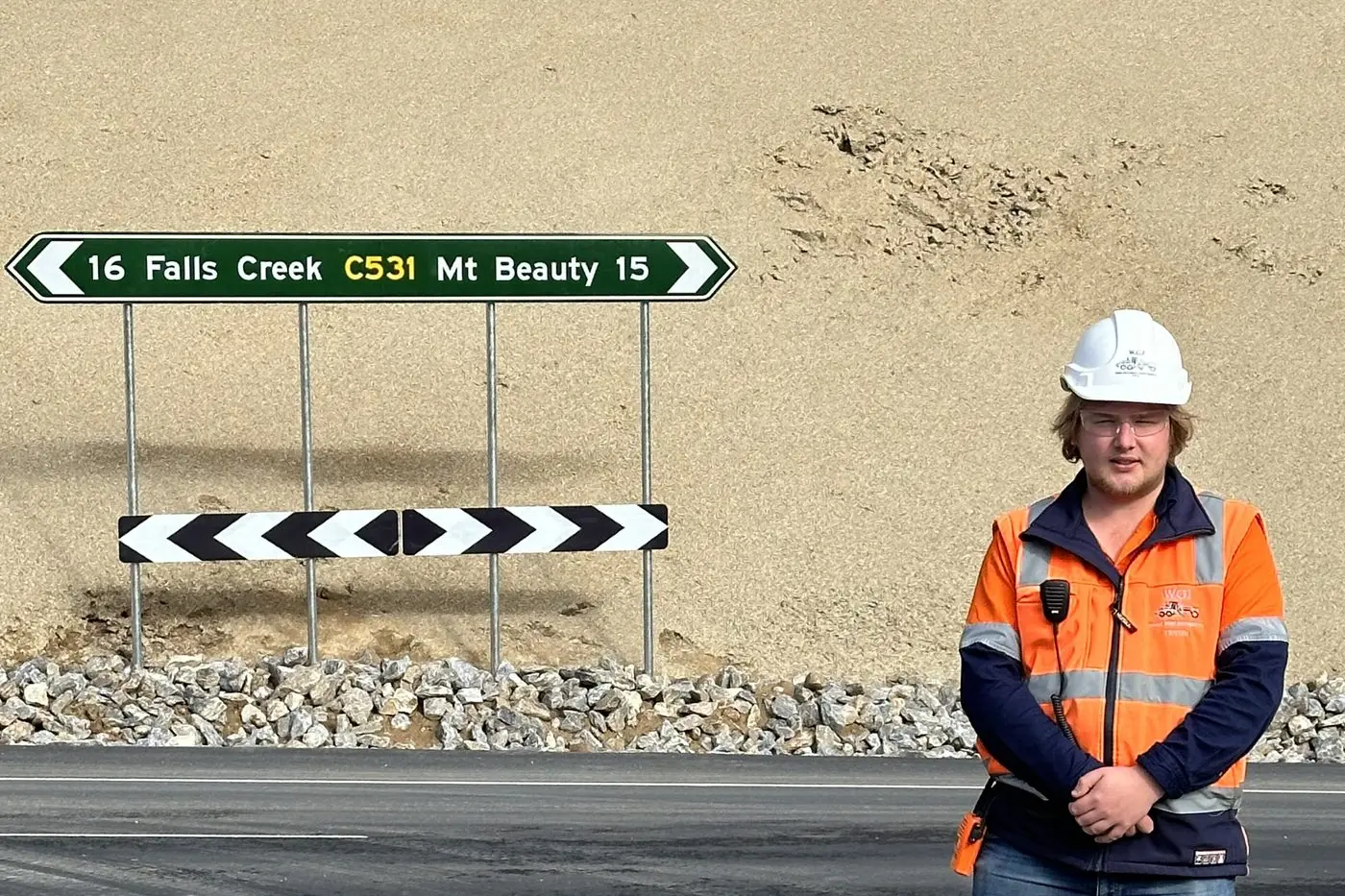 ON THE JOB: Tristen Biesse is working hard on the Bogong High Plains Road to keep locals safe. PHOTO: MRPV