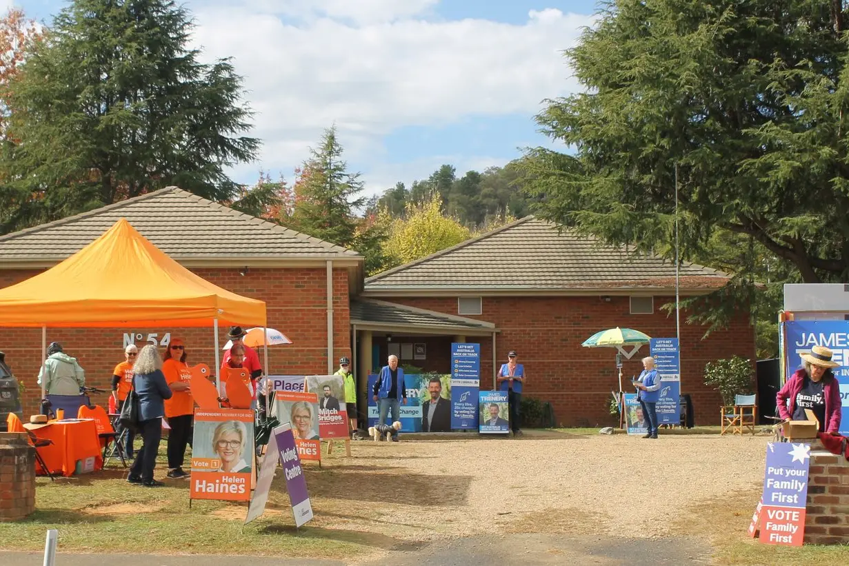 CAST YOUR VOTE: Candidates\\' supporters have been out in force at the early voting centre at the Masonic Hall in Bright. PHOTO: Phoebe Morgan