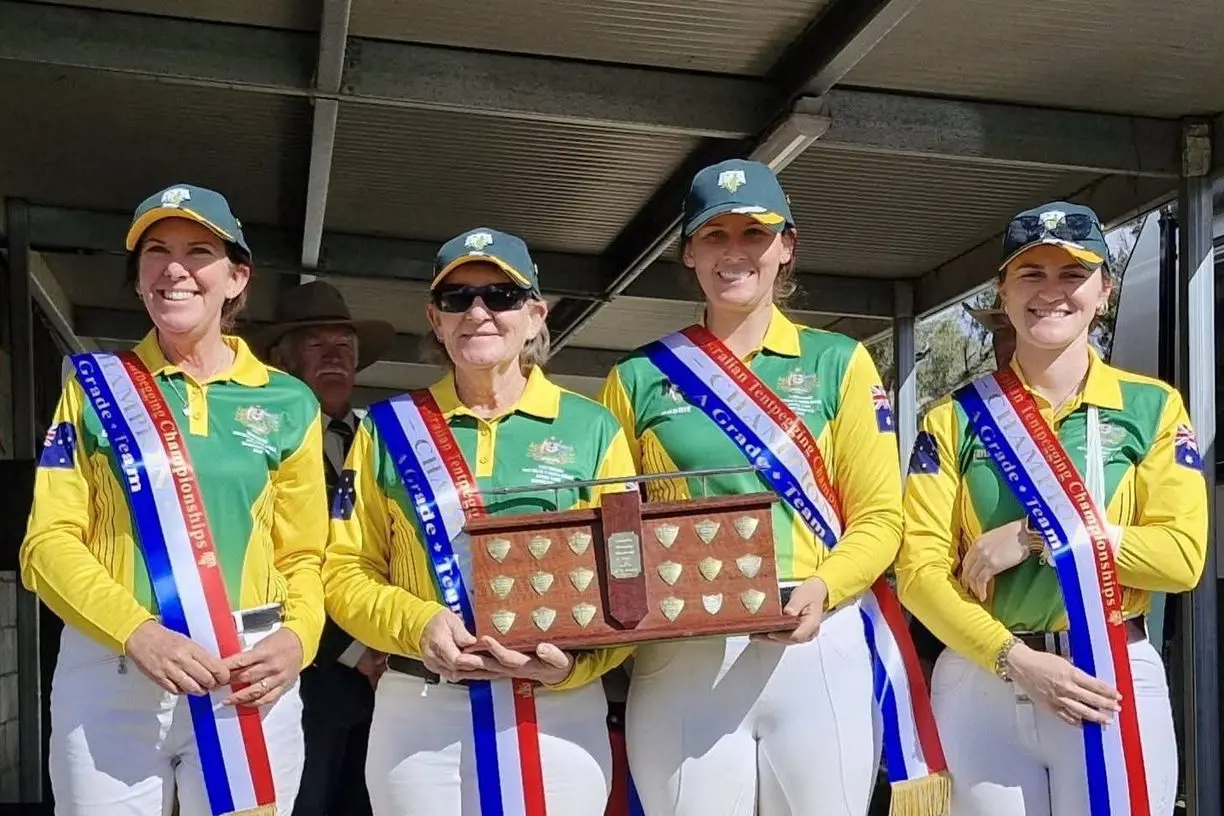 AUSSIE CHAMPIONS: (From left) Christine Staats, Donna Davidson, Brodie Chandler, and Taylah Smithon the dais after their championship success. PHOTO: Jo Watson