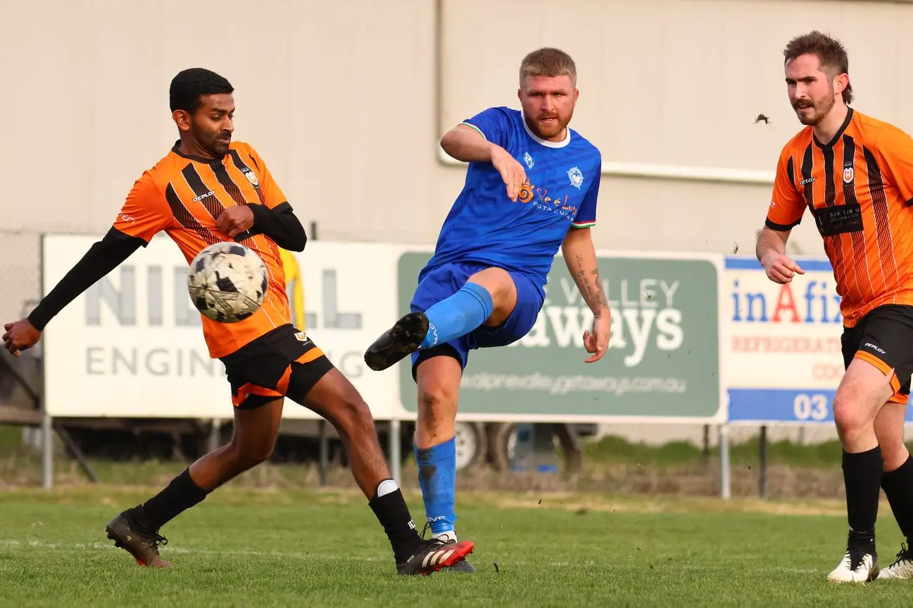 CREATING A CHANCE: Tyler Curran chips a pass into the box in Savoy\\'s 4-0 win over Heart. PHOTOS: Janet Watt