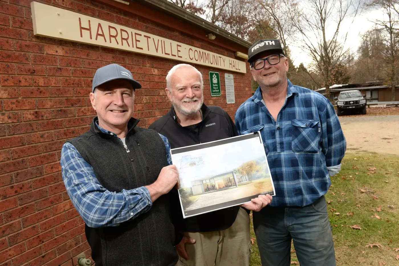 HERE WE GO: Harrietville Hall Committee of Management chair Simon Jones, secretary/treasurer Roger Haddrell and committee member Rolf Schonfeld with plans for the hall. PHOTO: Brodie Everist