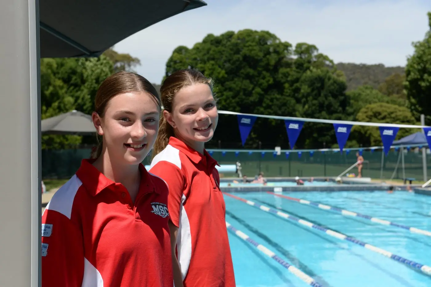 BRING IT ON: Myrtleford Swimming Club members Daisy Howell and Milla Corcoran are looking forward to competing at the Victorian Long Course Swimming Championships this weekend in Wangaratta. PHOTO: Brodie Everest Id:36000