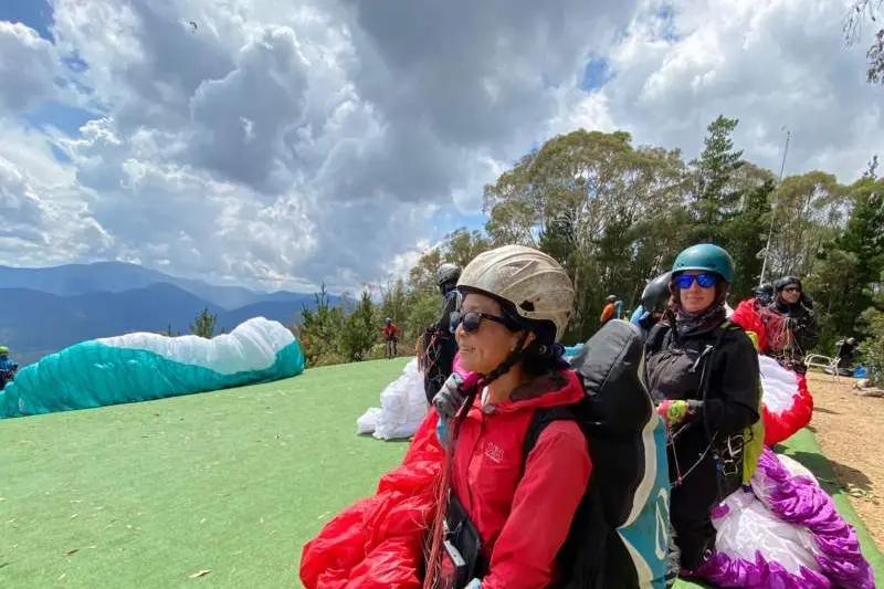 TAKE OFF: Local pilots Vivian Lim and Lucy Legget waiting for launch at Bright\\u2019s Mystic launchpad last week.\\nPHOTO: Christie Hamilton