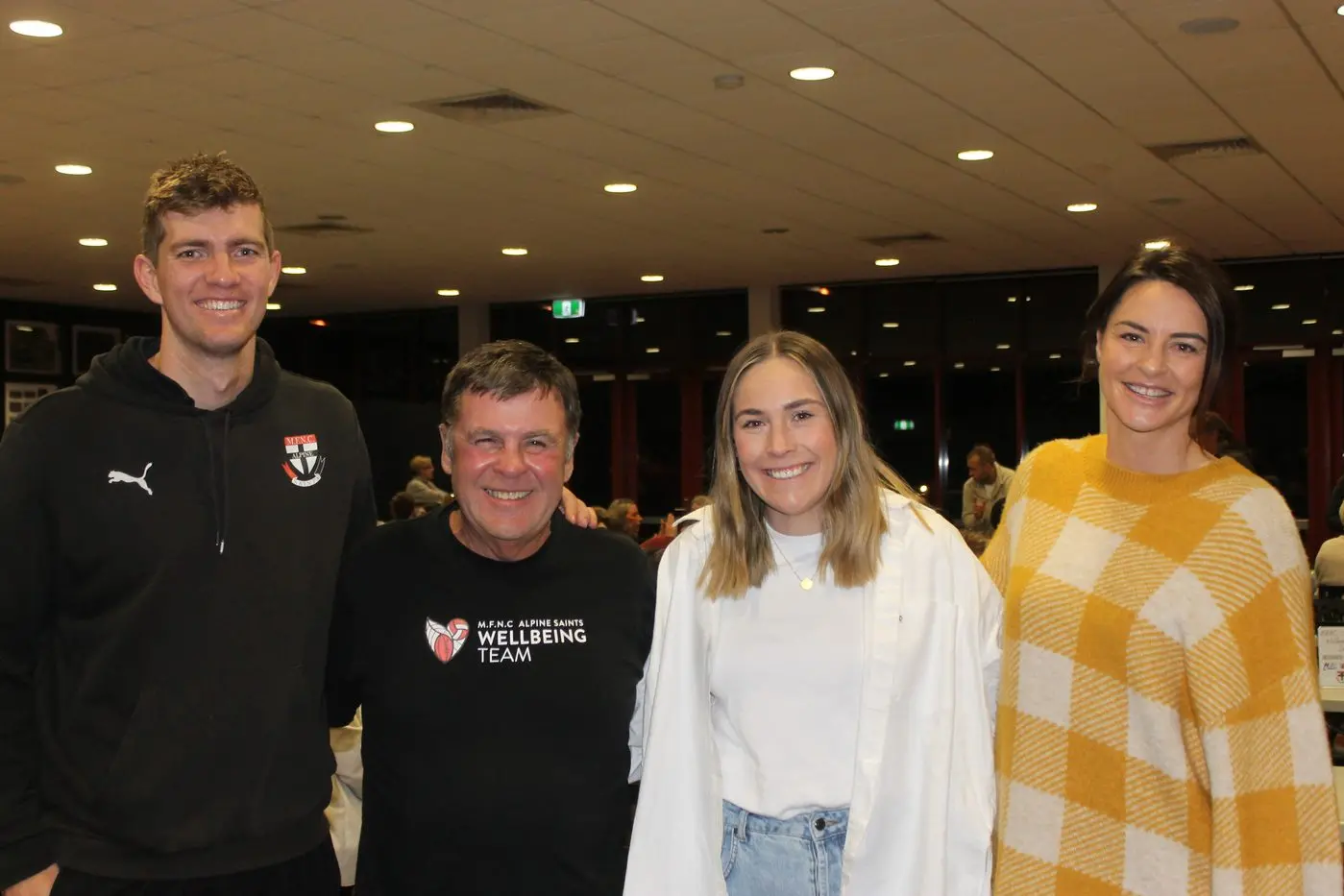 HEALTHY EXERCISES: Saints\\' football vice captain Riley Sharp, wellbeing team leader John Pryor, senior netball coach Liv La Spina and guest speaker Sharni Layton shared an evening with the MFNC and Myrtleford community to spread the word about good mental health practices. PHOTOS: Phoebe Morgan