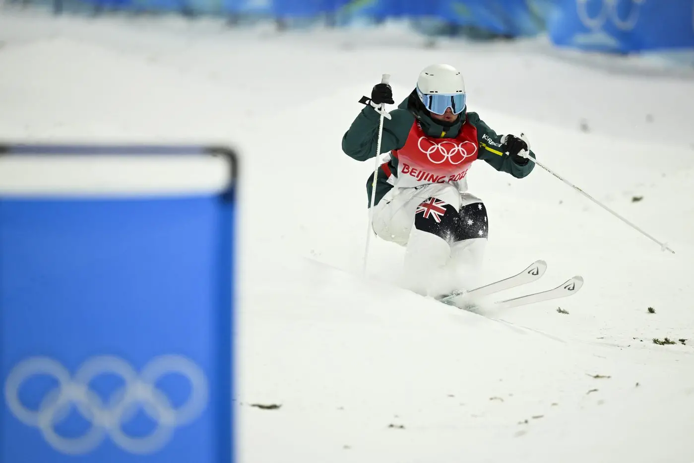 DOING US PROUD: Mt Beauty\\'s Britt Cox competes in the moguls qualifying final, placing 14th in the women\\'s moguls at the Beijing Winter Olympics on Sunday. PHOTO: Dan Himbrechts/AAP  Id:20116