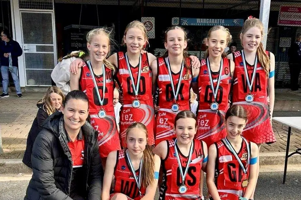 PREMIERS: The Saints White premiership team (back from left) Lila Murray, Mackenzy Reynolds, Anna Rochow, Evie Petricevich, Violet McKeone (front row) Rebecca Piazza (coach), Charlie Pugh, Elle Morrison, and Lexi Piazza.
