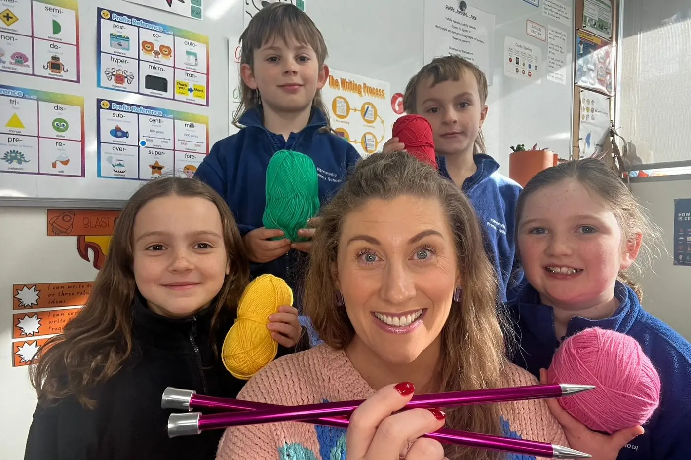 KIDS GET THE KNACK OF KNITTING: Teacher Anna Reid with students Ella Biggs (left), Gus Hinchliffe, Ben Martin and Joni Leask, celebrating the creative potential of crafts.