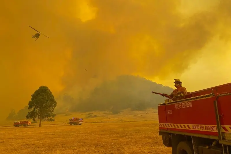 VERY CLOSE CALL: Firefighters from the Ovens Valley CFA strike team work to contain a fire in Nug Nug that sparked from the Mount Buffalo blaze in January when the air quality was \\u2018Very Poor\\u2019 and \\u2018Hazardous\\u2019 for several days. PHOTO: Rhett Chalwell