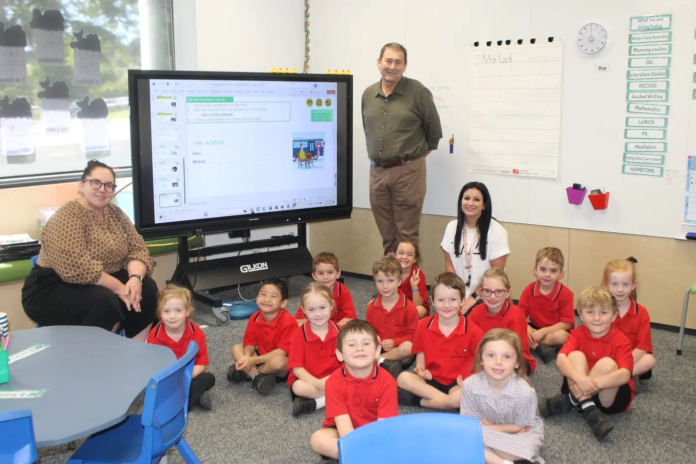 ELECTRIC EDUCATION: Myrtleford P-12 College principal Zlatko Pear dropped in to a prep class to see the fruits of previous funding, with  teacher Kath Lock (left) and Renee Bau making the most of a digital whiteboard. PHOTO: Phoebe Morgan