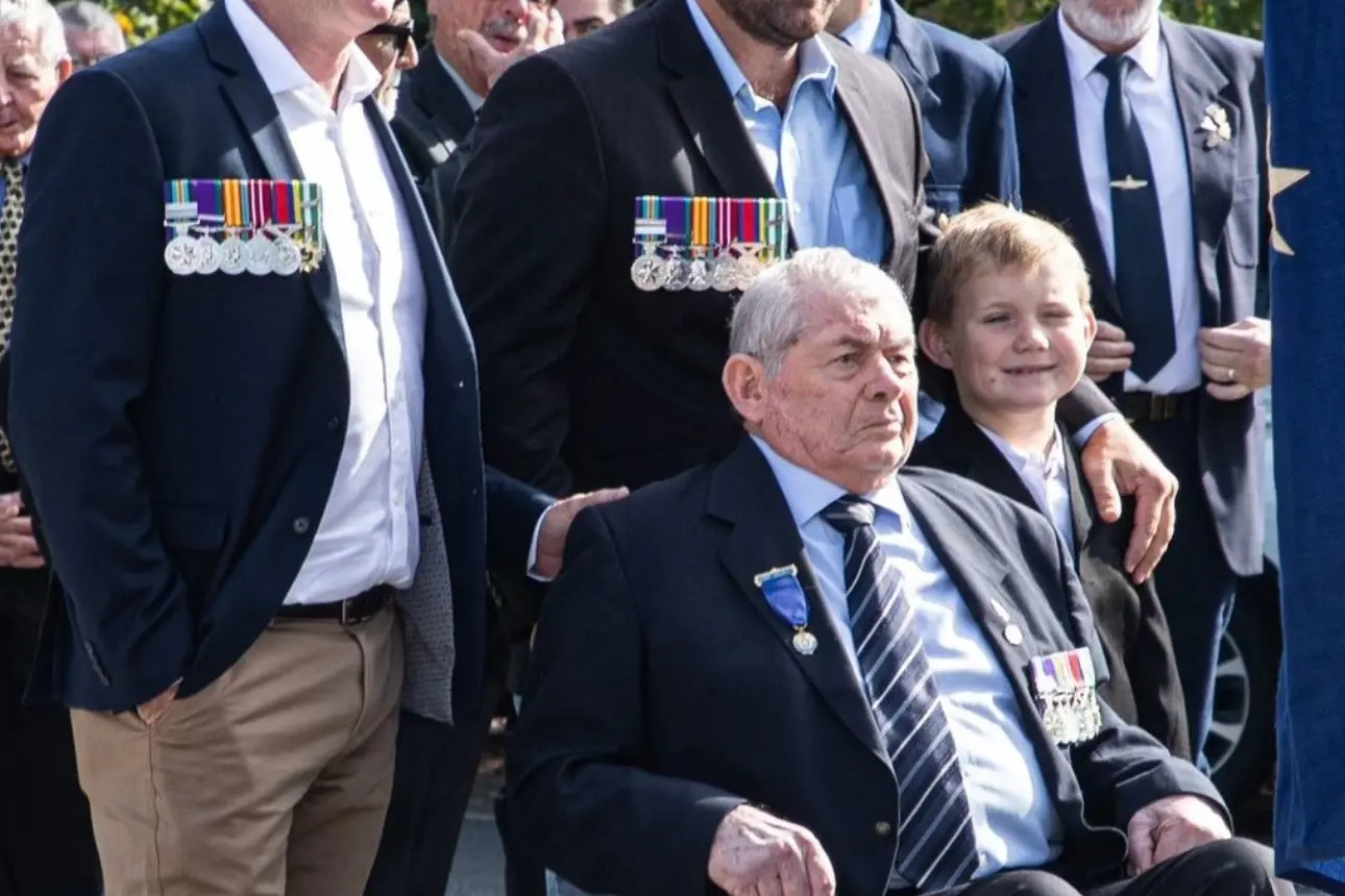 SADLY MISSED: The late Kevin Pitts OAM, pictured at the Myrtleford Anzac Day parade this year with his sons Steven and Gavin and grandson Baxter. Id:27302