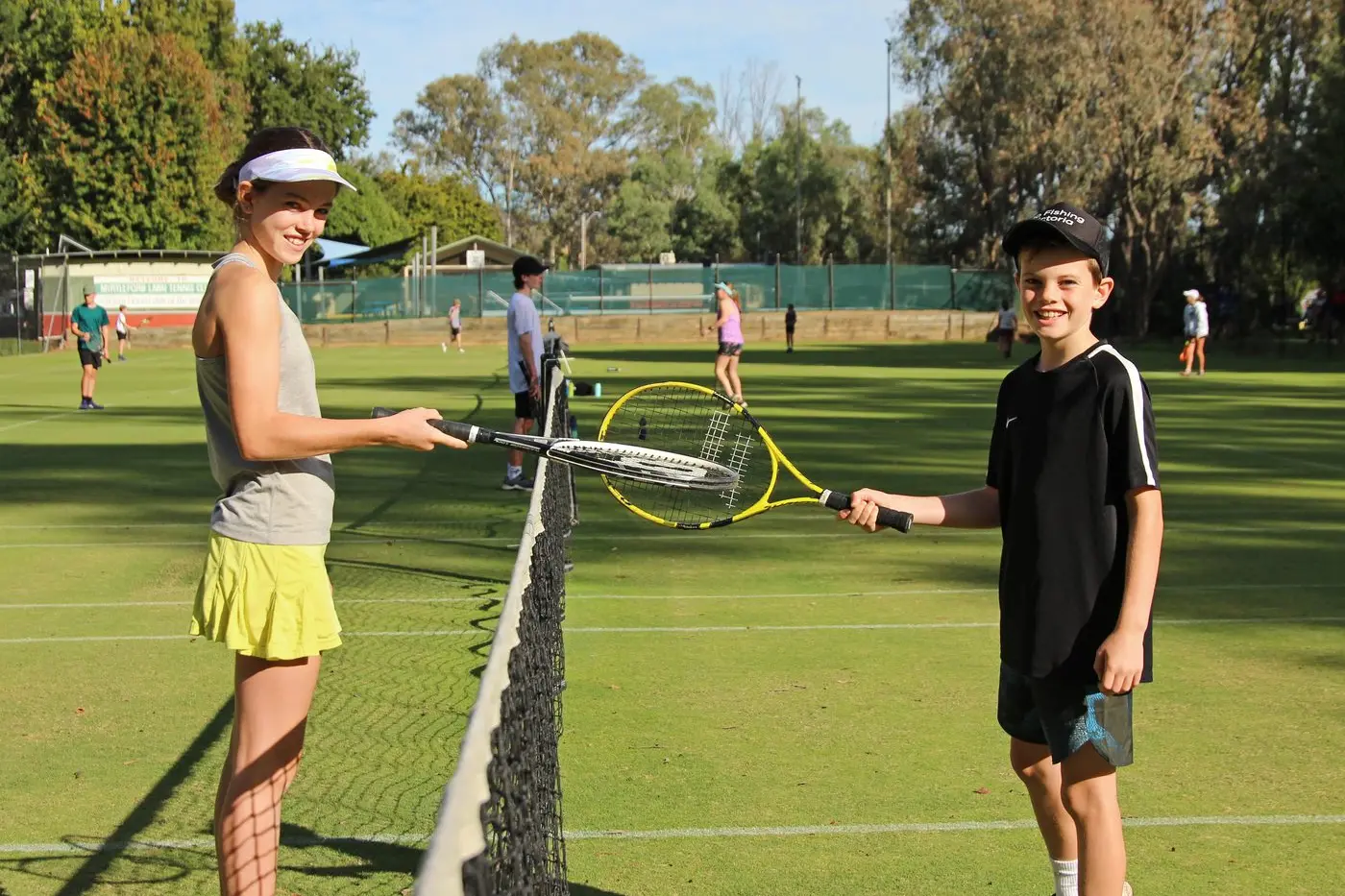 READY TO PLAY: Gemma and Claye Corcoran warm up for the Myrtleford Lawn Tennis Club\\'s famed Easter Tournament this weekend. PHOTO: Janet Watt Id:39357