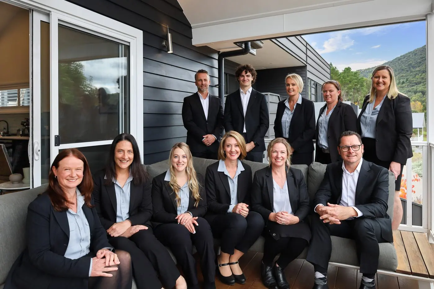 THE TEAM TOGETHER: Members of the Dickens Real Estate team. Agency manager Kellie Gray and director and licensee Gerard Gray pictured at bottom right.