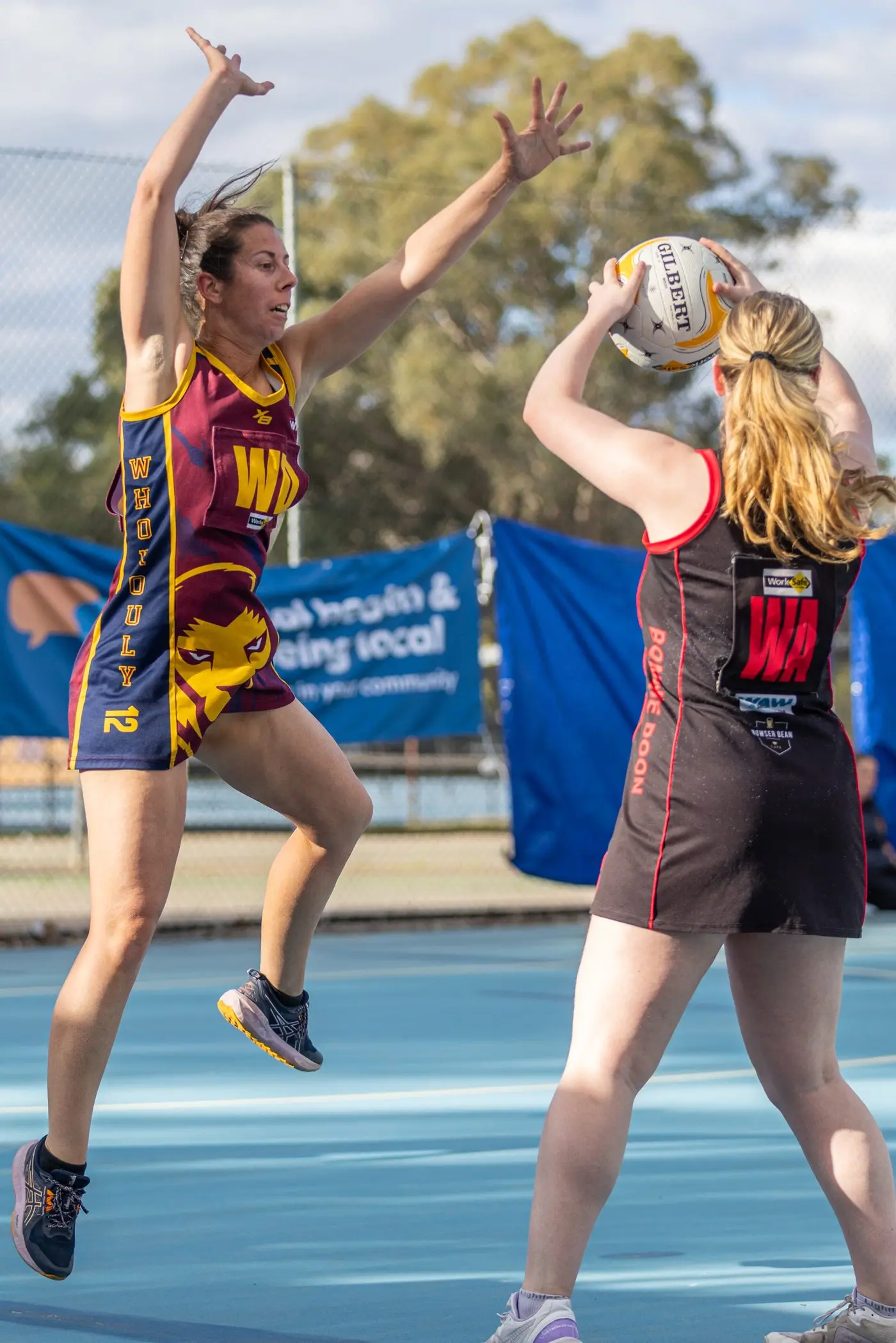 SOLID DEFENCE: Sally Wood puts the defensive pressure on.