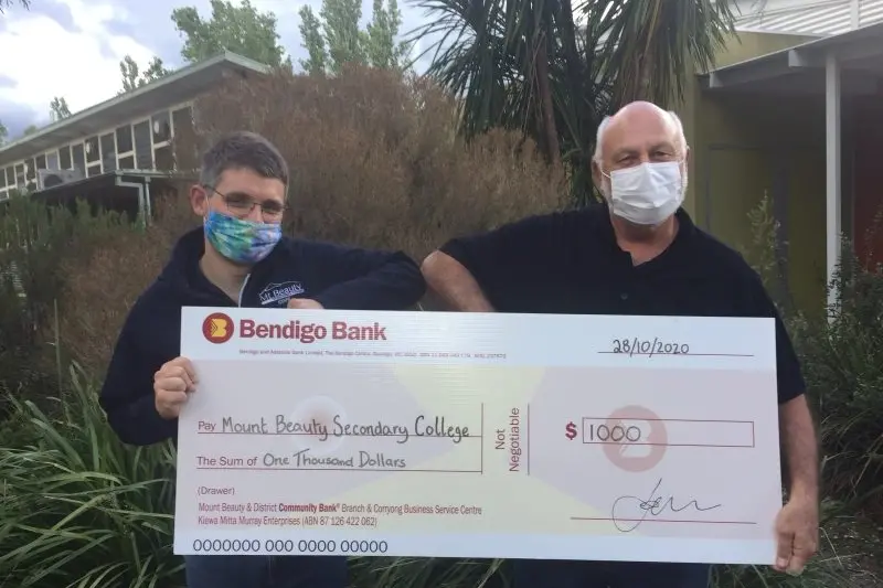 NEW FUNDS:  Music teacher Braam d \\'Villiers with treasurer for the David Vigo Scholarship, Henry Ziemnicki. PHOTO: Fay Mason