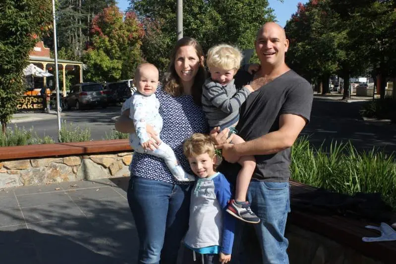LET US HELP: Jess and Gary Cox with their kids Joshua, Oliver and Alex in Bright on Monday. The first pair of buddies were connected on Sunday night.