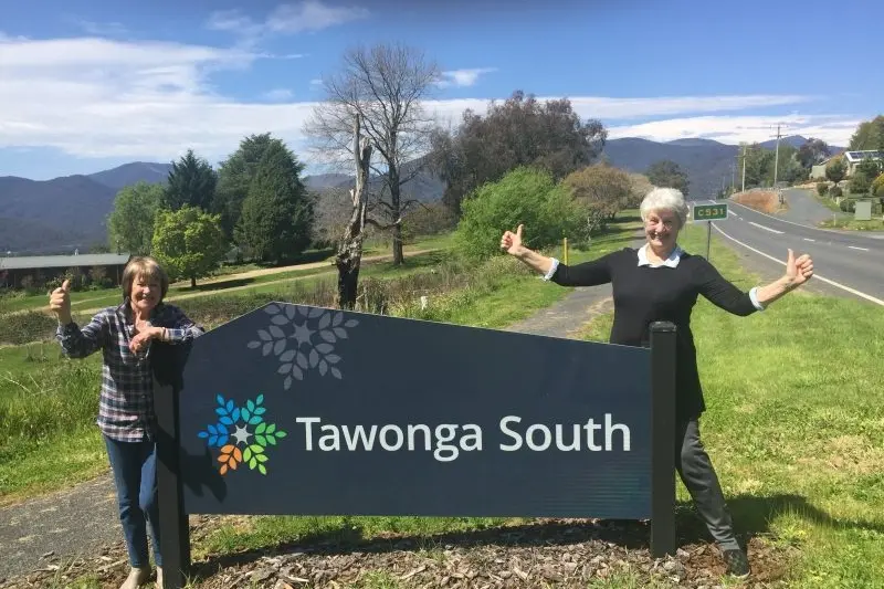  WE\\u2019RE BACK: Tawonga South business owners and residents like Maria Pantling and Ruth Pollock are relieved and happy to have been included in the latest amendment to the border bubble, meaning they can travel across the border and welcome interstate travellers again. The battle to include other Alpine Shire towns closer to Bright continues. PHOTO: Fay Mason