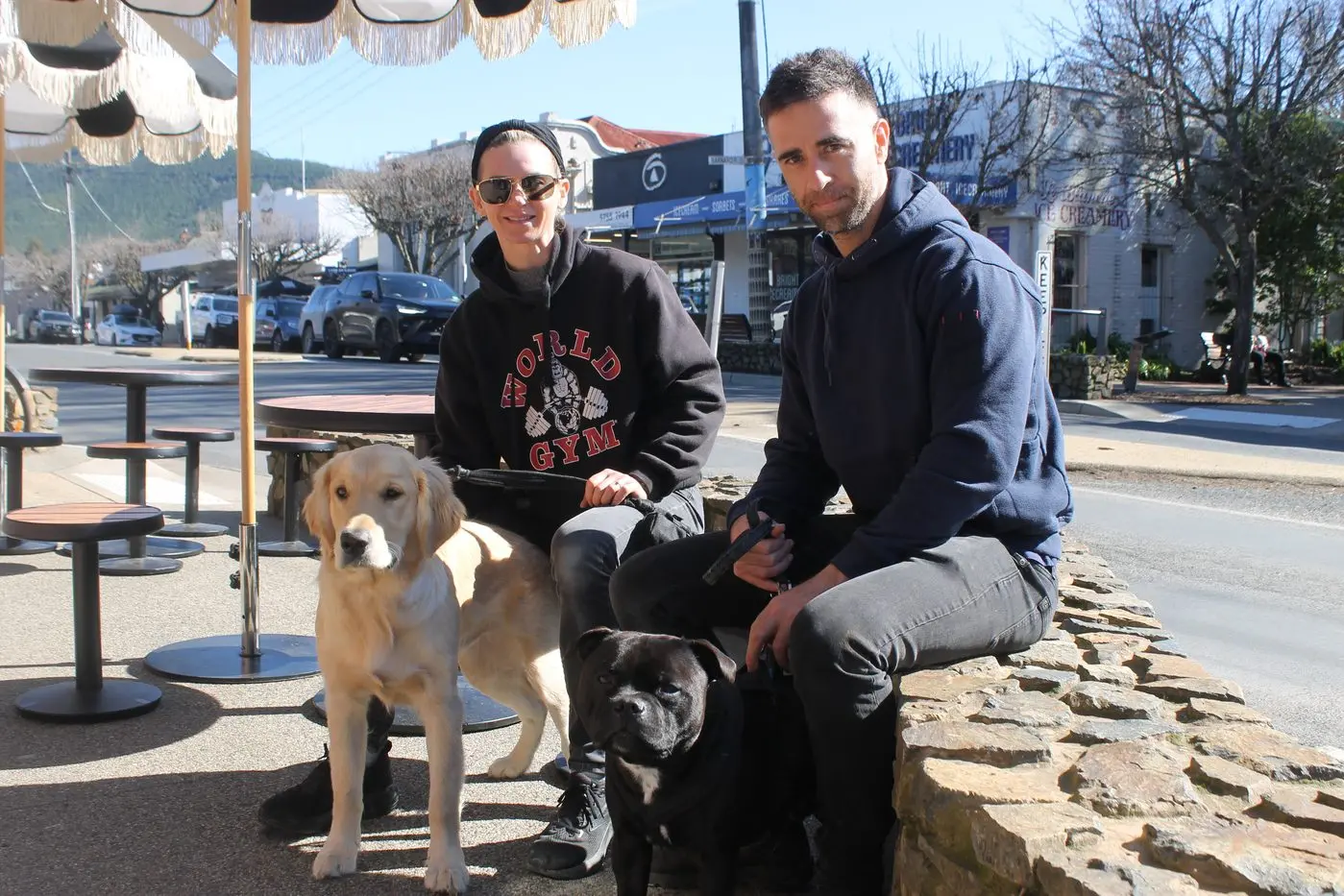 Bright\\'s people around town: Tasha and Matt Jones and Harry the Golden Retriever and Motley the Staffie.