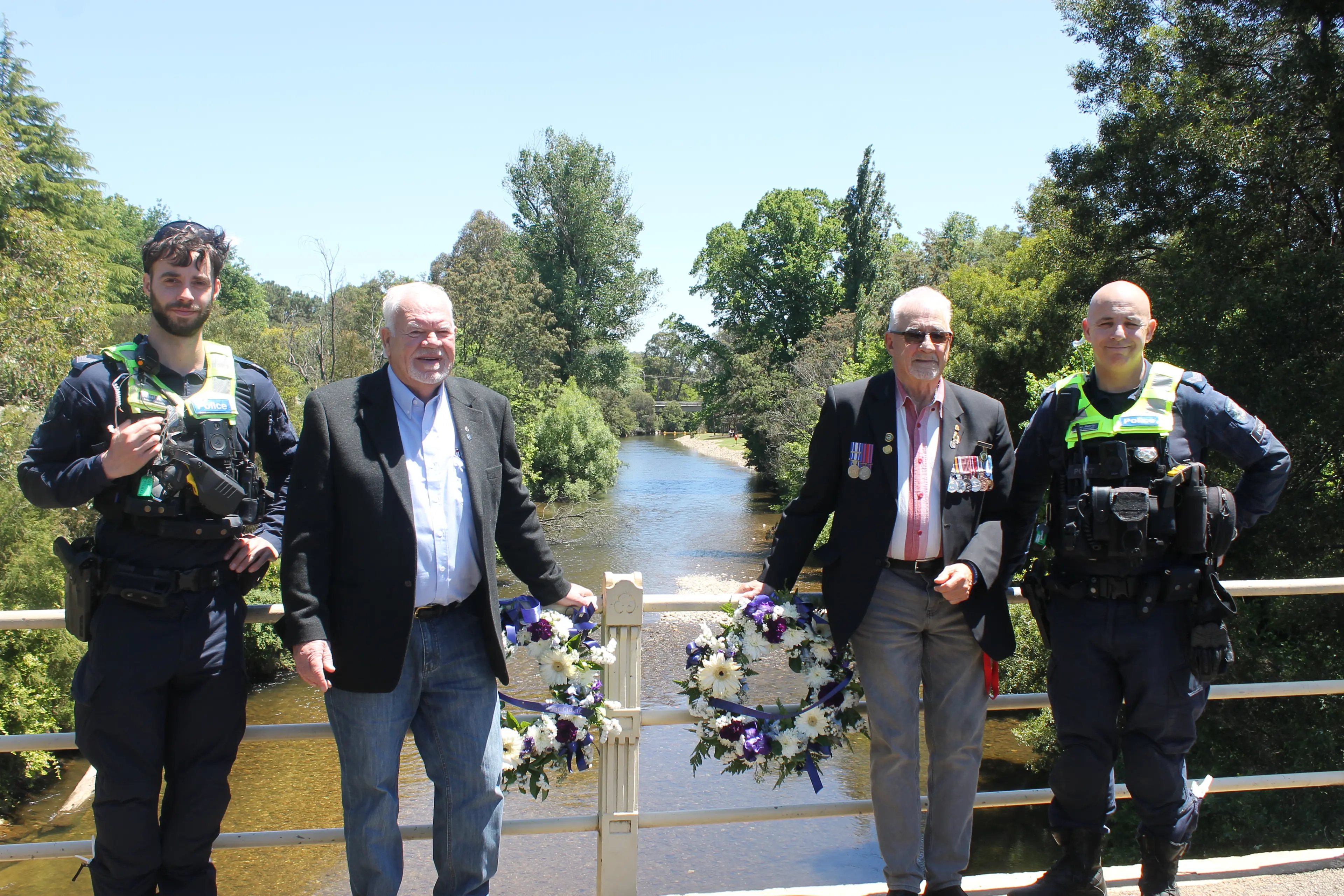 <p>PRESENT AND THE PAST: Senior Constable Daniel Mioni, Kim Walsh, Rob Bailey and Senior Constable Paul Harris. PHOTO: Phoebe Morgan</p>\\n